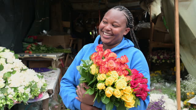 Cheerful Nairobi flower seller small business owner