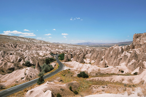 Cappadocia ,Turkey - May 24, 2020: Beautiful landscape with winding road in the valley of Cappadocia
