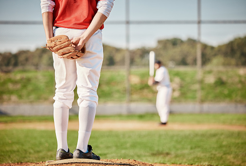 A youth league pitcher delivers to the plate. Fastball, you're out.