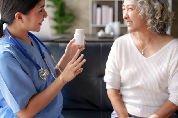 istock Asian female doctor explaining treatment and taking medicine. 1607357545