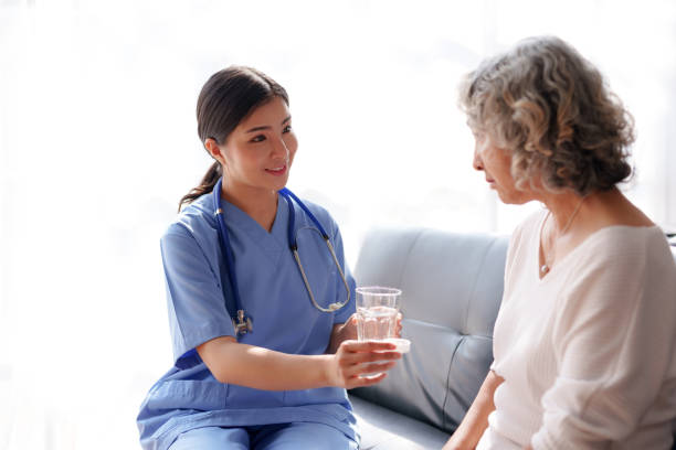 istock Asian female doctor explaining treatment and taking medicine. 1607357553