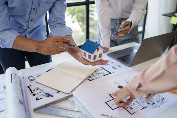 istock Project planning meetings with engineer or architect working together to model home and use engineering tools to create model and blueprint at work. 1607370654