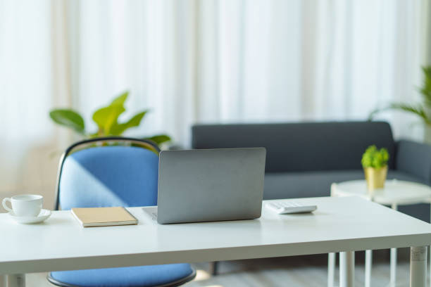 istock Image of a modern modern office work room with a personal computer laptop in the executive office emphasizes privacy and orderliness in the office. 1607370664