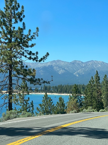 Lake Tahoe, view from the road, Sequoia trees and mountains, coastline of the lake, California