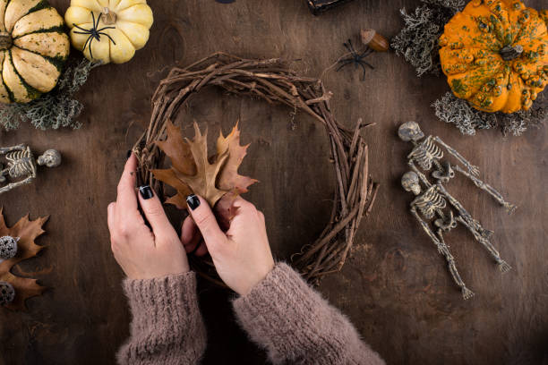 istock Process of making Halloween wreath. 1607394915