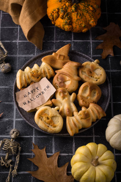 istock Halloween muffins in shape of bat and ghost 1607395856