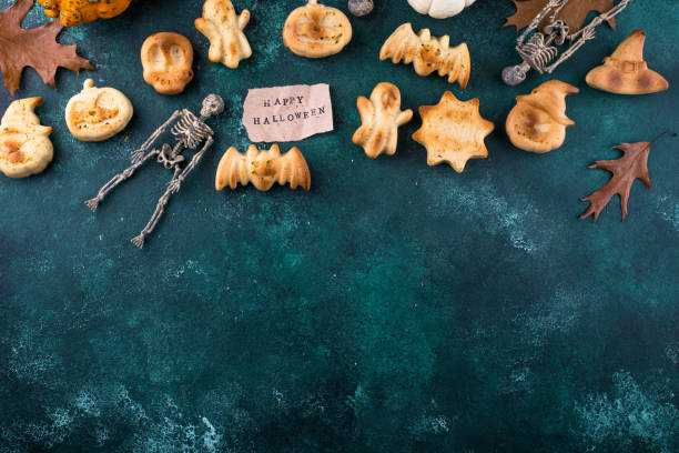 istock Halloween muffins in shape of bat and ghost 1607395873