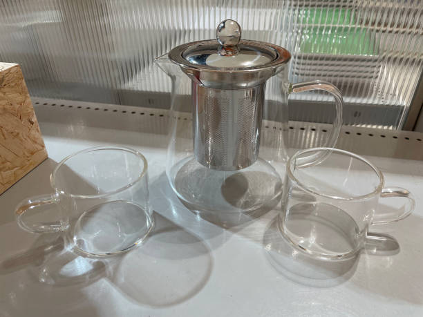 istock Set of glasses and clear water bottles. 1607399752