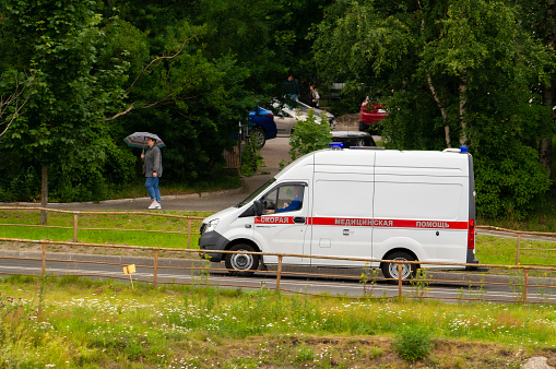 Petrozavodsk, Russia - 12 July 2023. ambulance going uphill