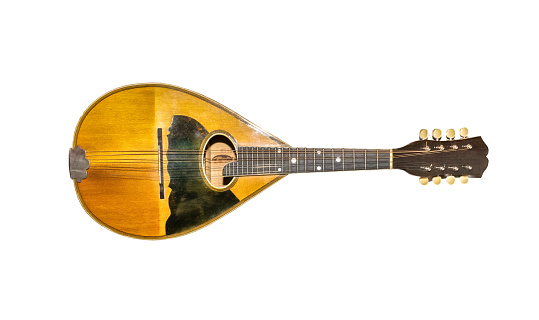 Beautiful Old vintage flat back mandolin from the Great Depression era isolated on white background