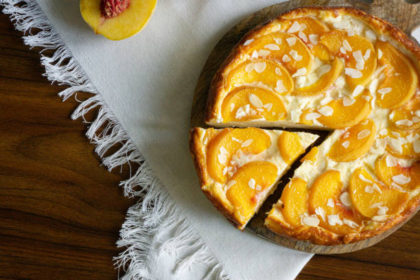 istock Casserole pie of cottage cheese with peaches 1607447081