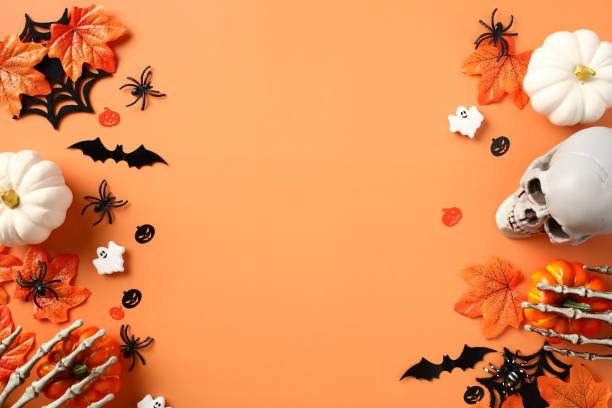 istock Flat lay composition with Halloween decorations, pumpkins, bats, ghosts, spiders, maple leaves on orange background. Halloween banner design, greeting card template. Flat lay, top view. 1607459074