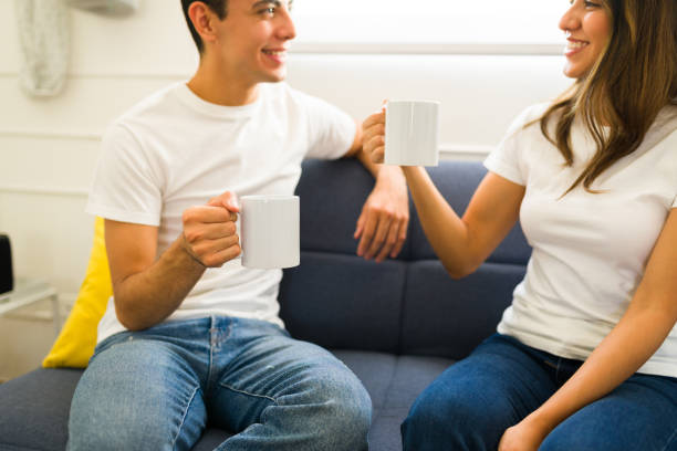 Relaxed couple using mock-up white products with copy space design