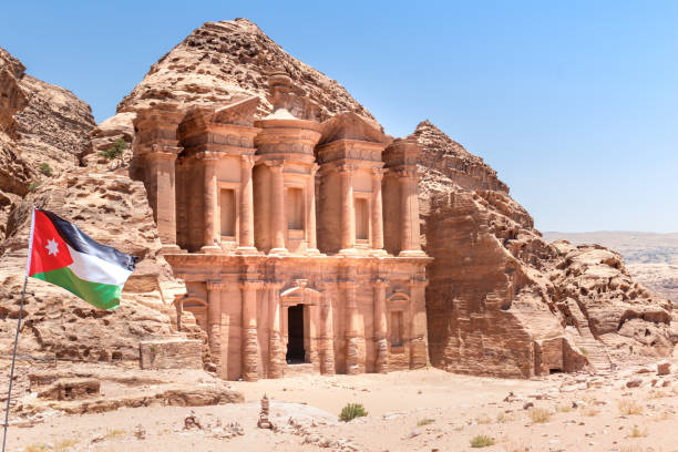 istock Jordanian Flag The Monastery, Petra, Jordan 1607476048