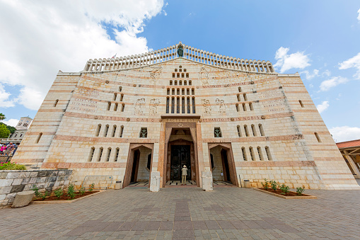 The Church of the Annunciation in Nazareth, Israel, is a revered Christian religious site that commemorates the announcement of the Virgin Mary's impending conception of Jesus by the angel Gabriel. It is one of the most significant holy places in Christianity. The church's architecture combines modern and traditional elements, and its focal point is the Grotto of the Annunciation, believed to be the location where the angel delivered the message to Mary. The site attracts pilgrims and visitors from around the world, reflecting its importance as a place of devotion and historical significance within the Christian faith.