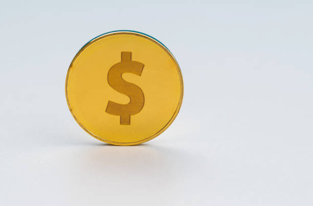 istock Gold coin with dollar sign 1607502698