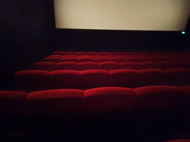 istock Empty Red seats in the movie theater. 1607502895