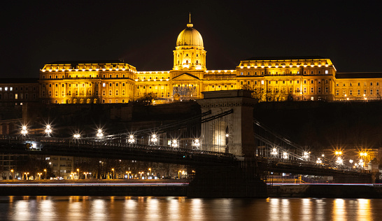 Budapest, Hungary - February 9, 2023: The Széchenyi Chain Bridge and Buda Castle at Night
