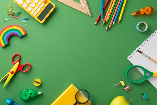 istock Captivating education imagery: A top-down view of a green chalkboard with an array of vivid stationary with ample space for text or promotional content, ideal for school-related advertising 1607532821