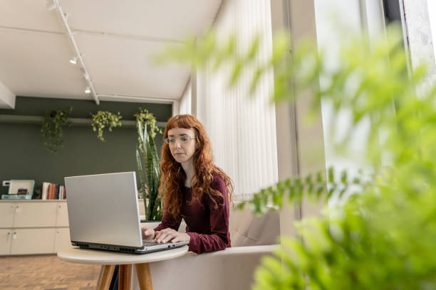 istock Autistic woman working in coworking 1607548424