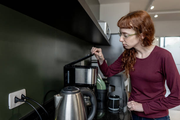 istock Woman with autism preparing coffee 1607548466