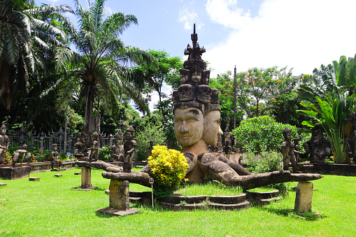 Buddha statue at Wat Xieng Khuan or Buddha Park in Vientiane, Laos.