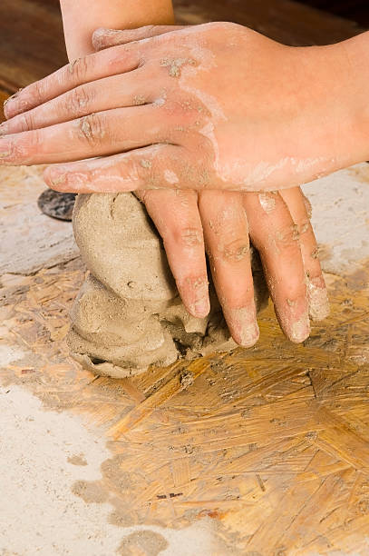 istock Child hands of a potter 160756658