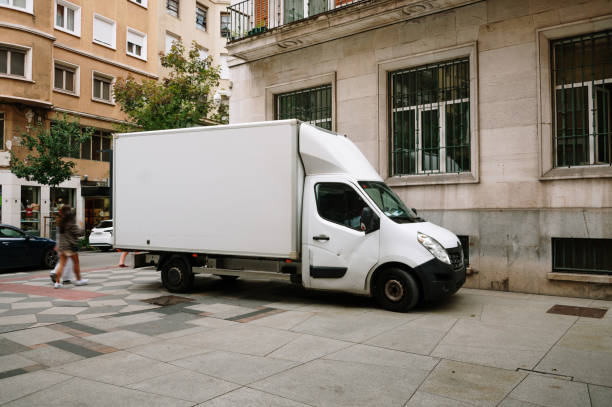 istock Small truck in a city 1607567559