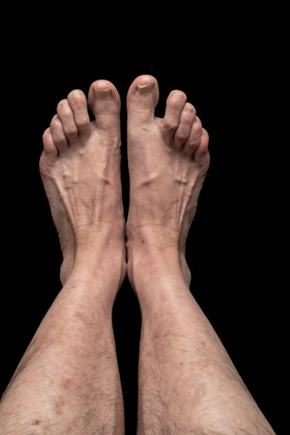 istock Feet of man in front 1607569887