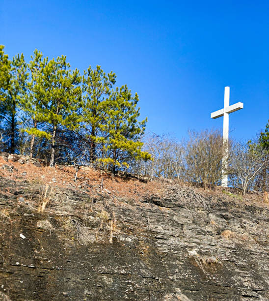 The Hunters Chapel, Holy Church of Christ cross sits on an Alabama hilltop.