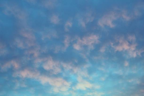 istock White light soft clouds floating in blue sky. Nature morning landscape background. Clear spring wind. Bright summer day. Winter calm air skyscape. Abstract panorama. Change climate. Low angle view 1607610934