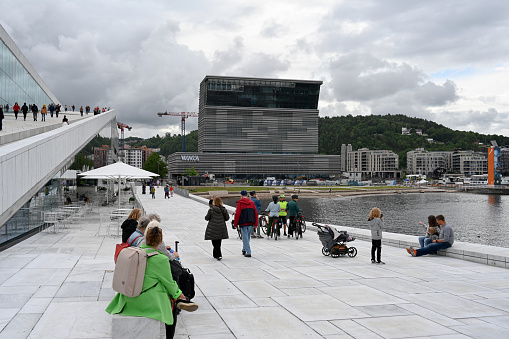 Oslo, Norway, July 3, 2023 - The Munch Museum (Munchmuseet in Norwegian) seen from Oslo Opera House.