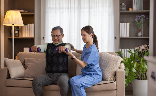 istock Home caregiver physio empowers seniors via exercises for strength, flexibility, aiding recovery. 1607629332