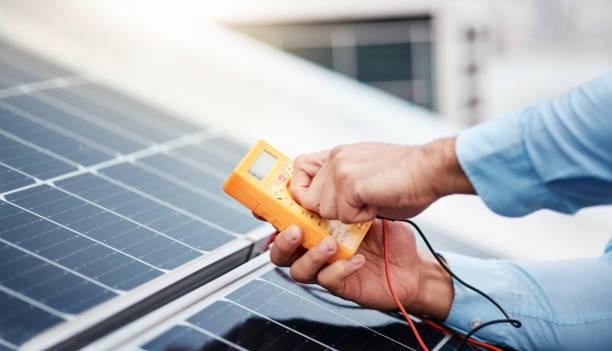 istock Solar panel, meter and engineering with hands of man for renewable energy, project and power. Construction, electricity and sustainability with closeup of contractor for tools, photovoltaic and grid 1607632867