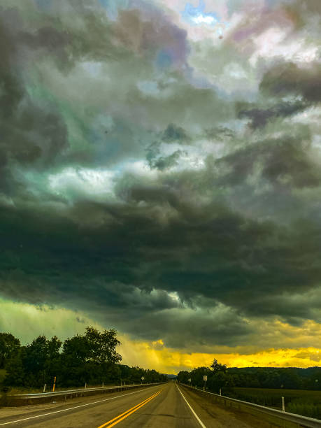 istock Summertime Thunderstorm Clouds in Pennsylvania Showing Rain and Sunshine 1607641697