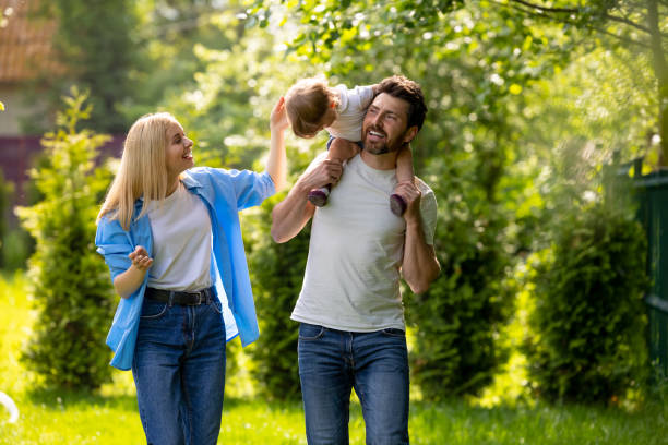 istock Parents and their cure kid spending time in the park 1607647705