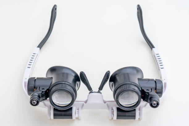istock magnifying glasses for detailed work in watchmaking or gynecology.  Led lightning. 1607665373