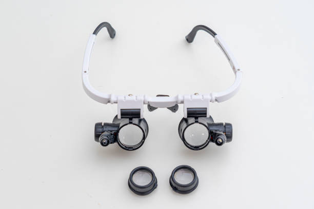 istock magnifying glasses for detailed work in watchmaking or gynecology.  Led lightning. 1607665547