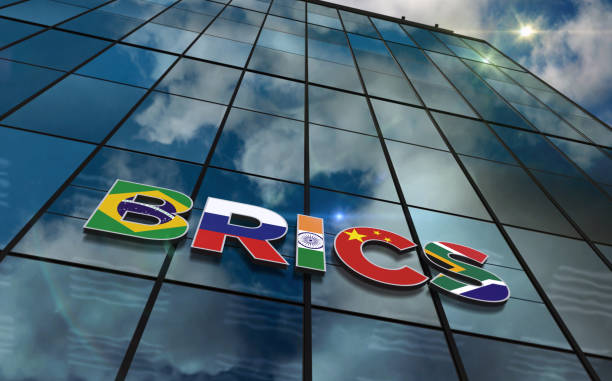 BRICS group glass building concept BRICS group glass building concept. Brazil Russia India China South Africa economy organization symbol on front facade 3d illustration. brics stock pictures, royalty-free photos & images