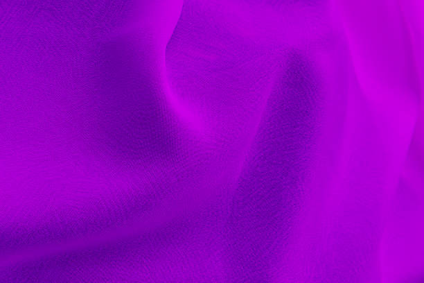 istock Purple fabric with large folds, abstract background. copy space for text. 1607736592