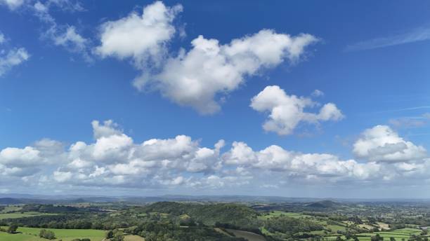 istock Puffy clouds over rural Wales 1607738764