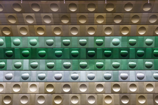 Geometric structure. Pattern. Pattern. Architecture element. Metal ovals, an element of wall cladding. Abstract background