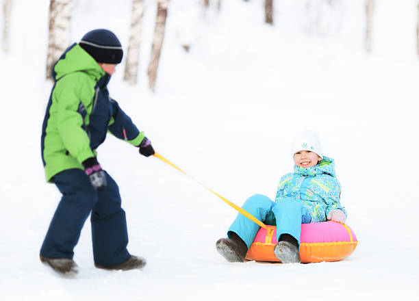 istock Children having fun in winter park. 160780444