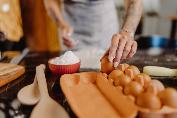 istock Woman making homemade pasta 1607812393