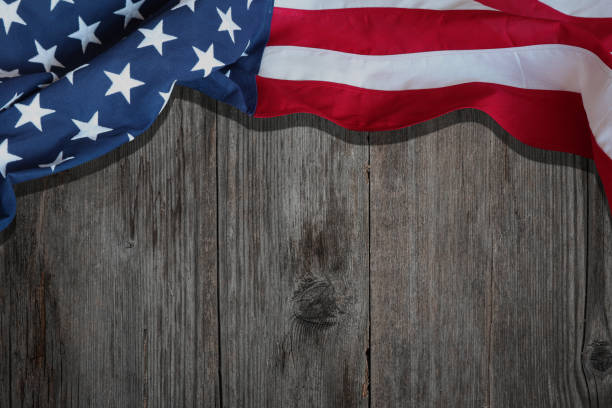 United States Flag On wooden background or backdrop, copyspace for your individual text. Memorial Day. Independence Day, Labor Day, Veterans Day. stock photo