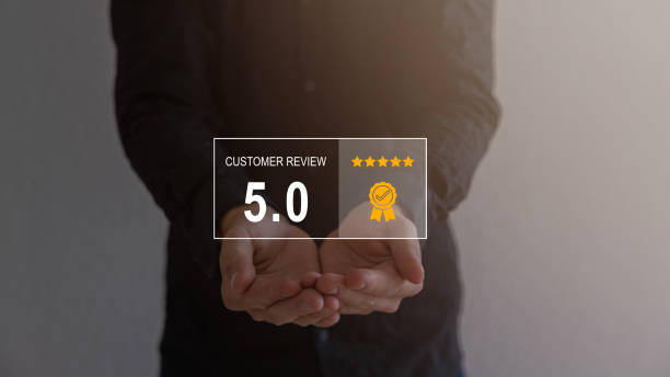 istock Costumer satisfaction on a dark office with a business men, 5.0. 1607843880