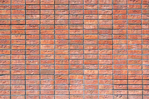 Unusual brickwork with bricks laid in regular rows and lines without any interlocking
