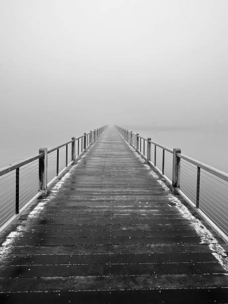 istock Foggy Pier At Dawn On Bay 1607852585