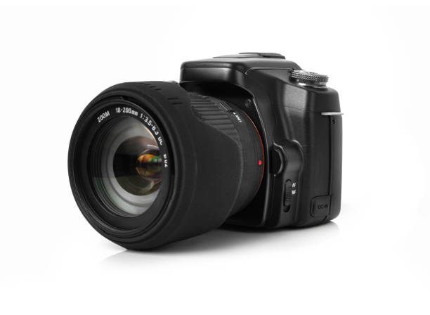 istock Old DSLR with a Zoom lens on white 1607854193
