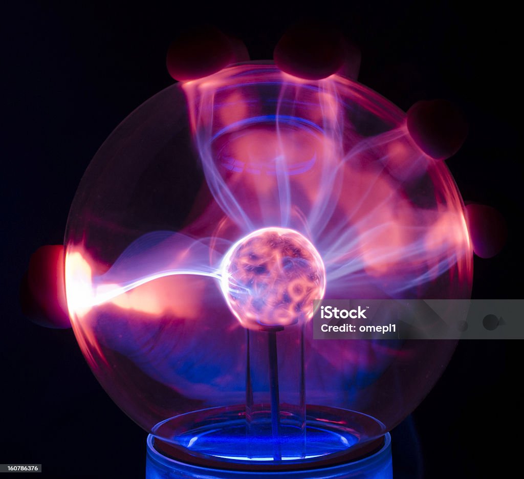De Plasma com uma luminária atrás palm - Foto de stock de Azul royalty-free